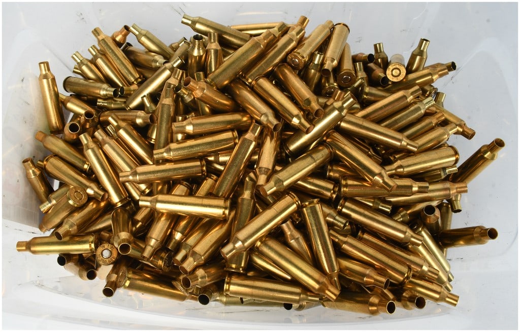 A Lot of 392 Winchester and Remington .22-250 Remington Brass Rifle Casings: This lot consists of a bulk quantity of 392 spent brass rifle shell casings chambered for the .22-250 Remington cartridge. Primarily manufactured by Winchester and Remington, these casings are intende