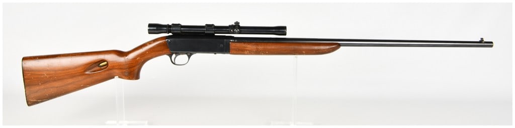 Remington Model 241 Speedmaster Semi-Automatic Takedown Rifle .22 LR with 24 Inch Barrel: This Remington Model 241 Speedmaster is a semi-automatic takedown rifle chambered for .22 Long Rifle. The firearm features a 24-inch round blued barrel equipped with a blade front sight and a smooth w