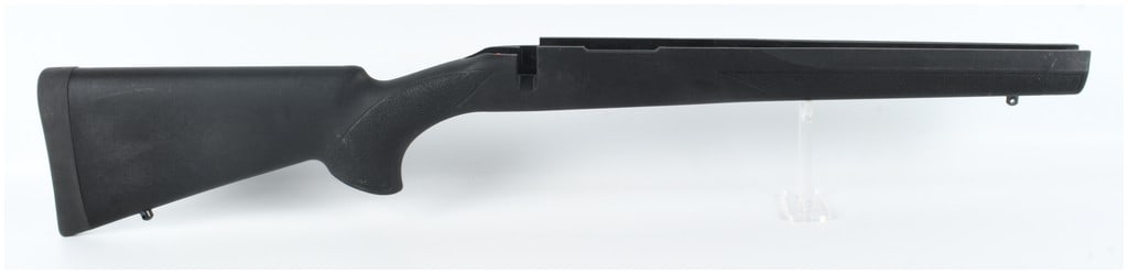Howa Short Action Synthetic Rifle Stock: A new Howa short action synthetic rifle stock. This single-piece stock is constructed from black polymer and features textured panels on the pistol grip and forend. Designed for a bolt-action rifle, t