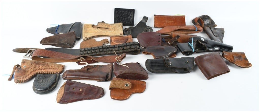 A Collection of 24 Vintage Leather Holsters and Belts including Size 38 Tooled Belt (1 of 12)