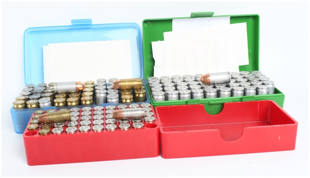 A Lot of 150 Rounds of Mixed .45 Auto and 9mm Luger Ammunition: This lot consists of 150 rounds of centerfire handgun ammunition organized within three plastic flip-top storage cases. The collection includes 100 rounds of .45 Auto ammunition and 50 rounds of 9mm L