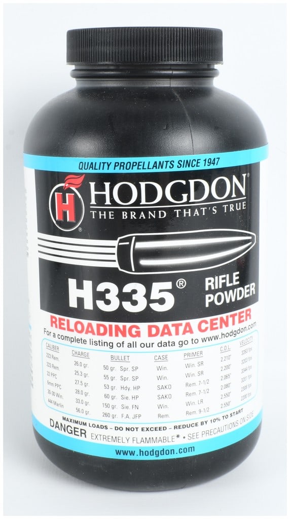 One Pound Container of Hodgdon H335 Smokeless Rifle Powder: This lot features a one-pound container of Hodgdon H335 smokeless rifle powder. The product is housed in a black plastic bottle with a matching ridged screw-top lid. The front label prominently displa