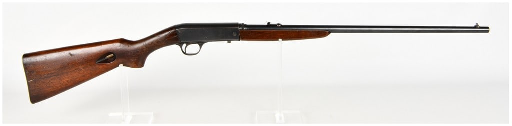 Remington Model 24 Semi-Automatic Takedown Rifle .22 Long Rifle with 19 Inch Barrel: This Remington Model 24 is a semi-automatic takedown rifle chambered for .22 Long Rifle. It features a 19-inch round barrel equipped with an adjustable rear notch sight and a blade front sight. The de