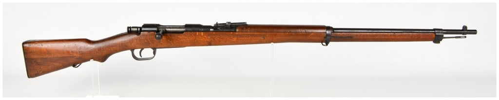 Koishikawa Arsenal Type 38 Bolt Action Rifle 6.5x50mm Arisaka with 31.4 Inch Barrel: This Japanese Type 38 bolt action infantry rifle is chambered in 6.5x50mmSR Arisaka and features the standard long-pattern configuration utilized by the Imperial Japanese Army. The rifle is equipped w