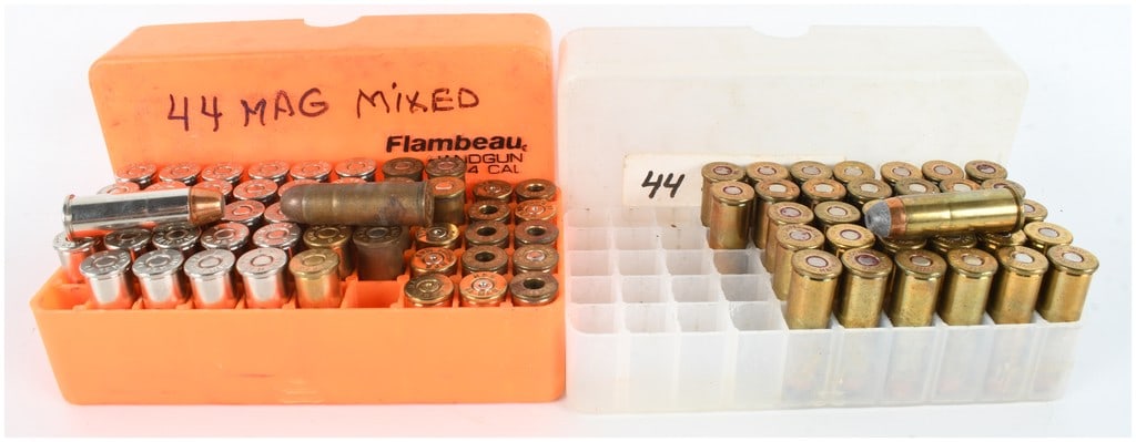A Lot of 83 Mixed .44 Remington Magnum Live Rounds and Empty Casings: This lot consists of a total of 83 components for .44 Remington Magnum, comprising 70 live rounds and 13 empty casings. The items are organized within an orange Flambeau brand plastic case and a clear