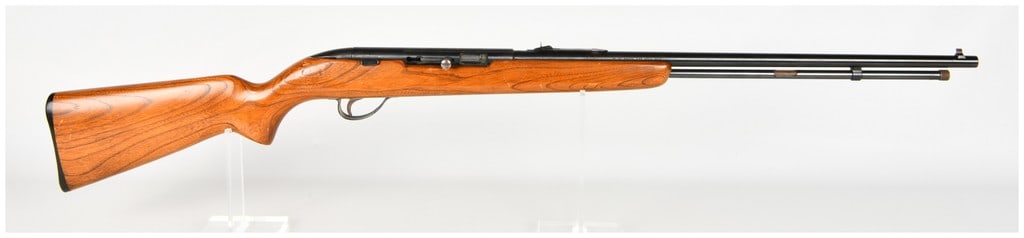 Sears Model 25 Semi-Automatic Rifle .22 Short, Long, or Long Rifle: This semi-automatic rifle is chambered for .22 caliber ammunition, specifically designed to function with .22 Short, Long, and Long Rifle cartridges. The firearm features a blued steel barrel and