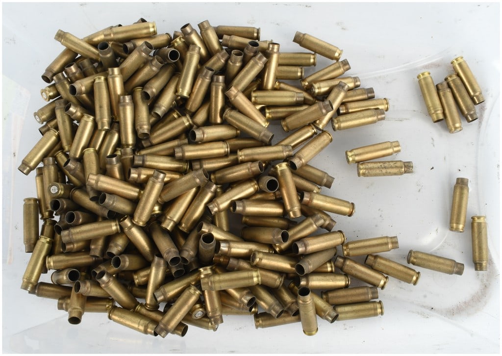 170 FN Herstal 5.7x28mm Spent Brass Ammunition Casings: A collection of 170 spent brass ammunition shell casings manufactured by Fabrique Nationale Herstal (FN Herstal). These centerfire casings are of 5.7x28mm caliber. The headstamps on the bases of the
