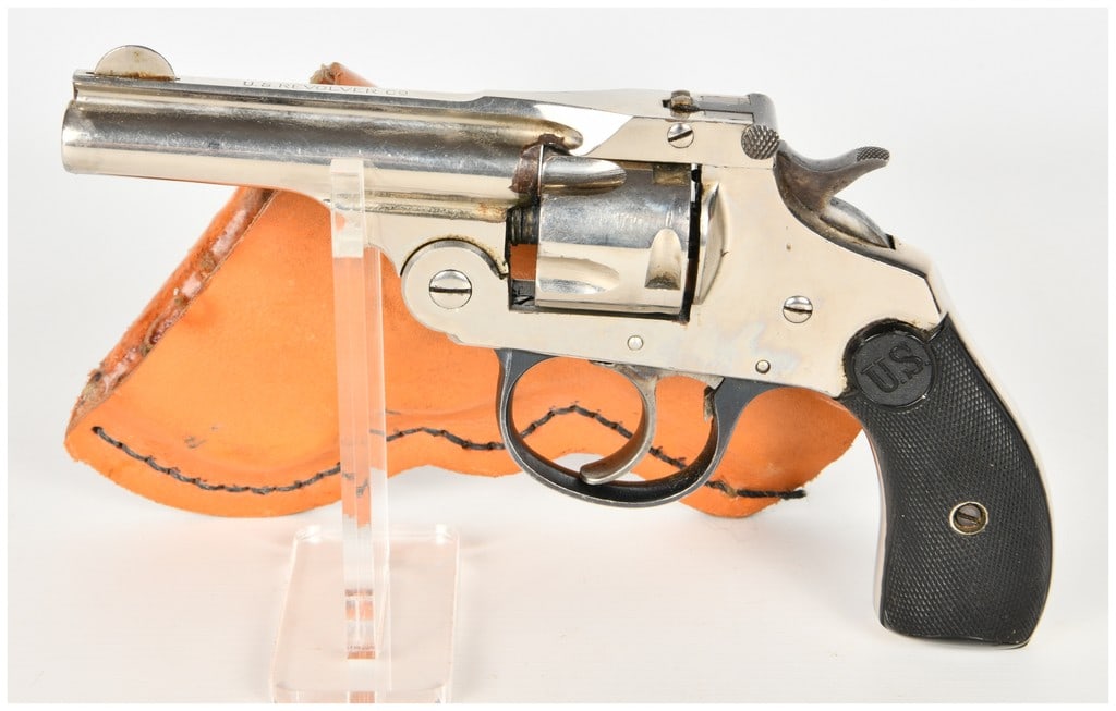 U.S. Revolver Co. Top-Break Double Action Revolver .32 S&W with 3 Inch Barrel: This is a U.S. Revolver Co. top-break, double-action revolver chambered in .32 S&W, designed as a compact personal defense sidearm during the early 20th century. The firearm features a 3-inch barrel e
