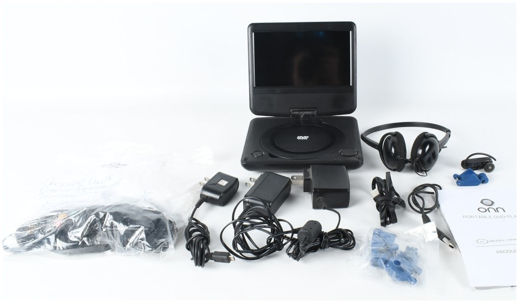 Two Electronics Items including an onn. Portable DVD Player and a PetSafe Remote Trainer: This lot consists of two distinct electronic items with their respective manuals and accessories. The first item is an onn. portable DVD player, model ONA19DP006, featuring a swivel screen. It feature