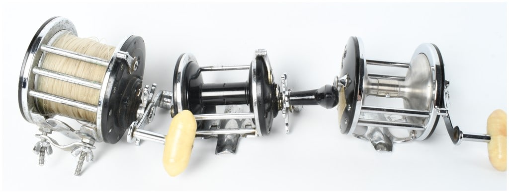 Three Vintage Conventional Saltwater Fishing Reels by Penn and Jalove: A group of three vintage conventional saltwater fishing reels manufactured in the United States. The collection consists of two Penn Long Beach models and one reel from the Jalove Reel Company. The fi
