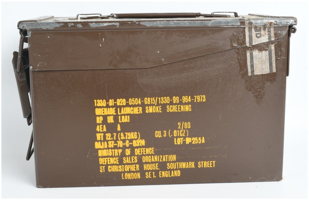 British Ministry of Defense Steel Ammo Can for Smoke Screening Grenades Dated 1980: This item is a British Ministry of Defense heavy-gauge steel ammunition transit case, originally manufactured for smoke-screening grenades. The box is finished in service-brown paint and features a to
