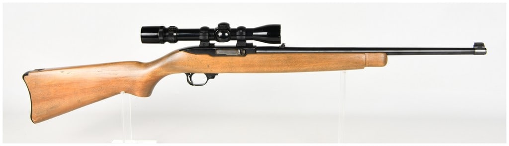 Ruger Model 10/22 Carbine Semi-Automatic Rifle .22 LR with 18.5 Inch Barrel: This Ruger Model 10/22 Carbine is a semi-automatic rifle chambered in .22 LR, configured for versatile target shooting and small game applications. The rifle features an 18.5-inch blued barrel and is 