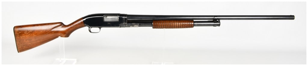 Winchester Model 12 Pump Action Shotgun 12 Gauge with 30 Inch Barrel: This Winchester Model 12 is a classic pump-action shotgun chambered in 12 gauge, configured as a takedown model for ease of transport. The firearm is equipped with a 30 inch barrel featuring a single 