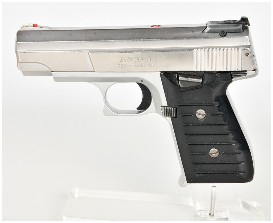 Bryco Arms Model Jennings Nine-CA Semi-Automatic Pistol 9mm: This Bryco Arms Model Jennings Nine-CA is a semi-automatic pistol chambered in 9mm featuring a two-tone finish with a polished nickel-plated slide and a matte silver-toned frame. The pistol is configu