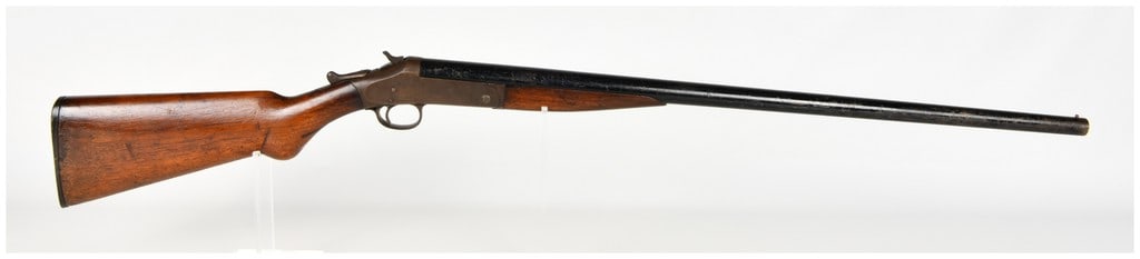 Harrington & Richardson Model 1900 Break Action Shotgun 16 Gauge with 28 Inch Barrel: This Harrington & Richardson Arms Co. Model 1900 is a single-shot, break-action shotgun chambered for 16 gauge. It features a 28 inch barrel equipped with a single brass bead sight at the muzzle. The 
