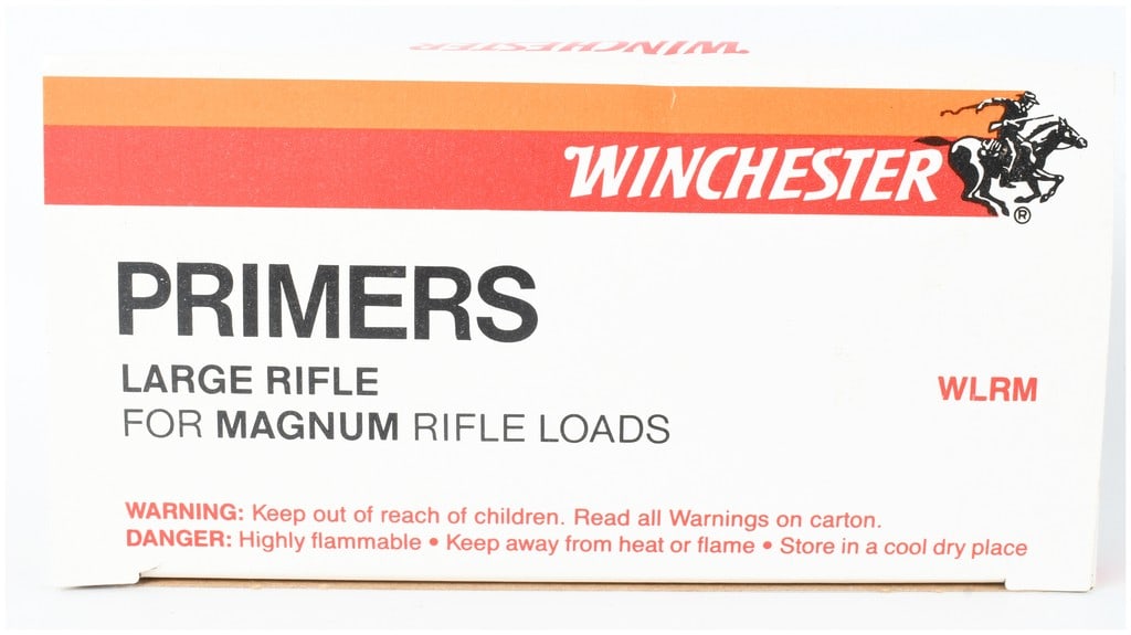 One Box of 1,000 Winchester Large Rifle Magnum Primers: This lot consists of one box containing 1,000 Winchester Large Rifle Magnum (WLRM) primers. The primers are designed for use in magnum rifle loads and are housed within their original vintage-style ca