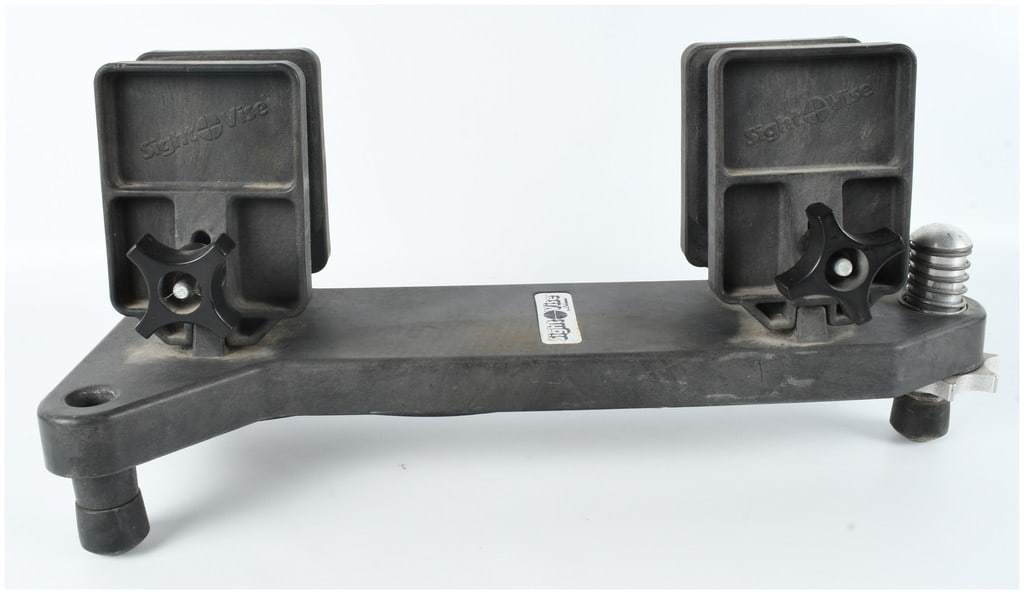 Lohman Sight-Vise Adjustable Gun Maintenance and Sighting Rest: This Lohman Sight-Vise is an adjustable firearm maintenance and sighting rest constructed of heavy-duty molded black plastic. The unit features a central beam supporting two vertical uprights with foa