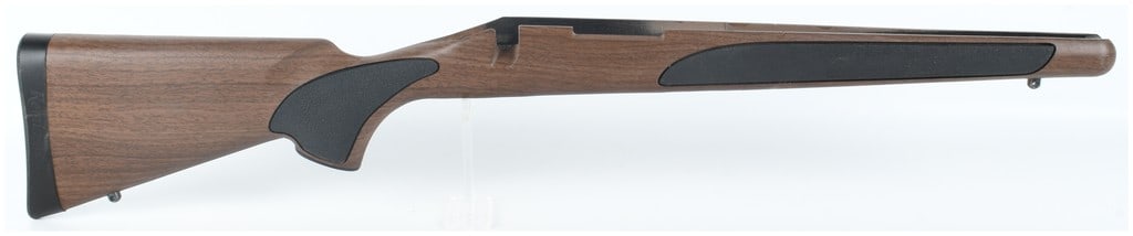 Remington Model 770 Bolt Action Rifle Stock with Wood Tech Finish: This is a Remington bolt-action rifle stock constructed from durable synthetic polymer and featuring a Wood Tech simulated grain finish designed to provide the traditional appearance of a Remington 70