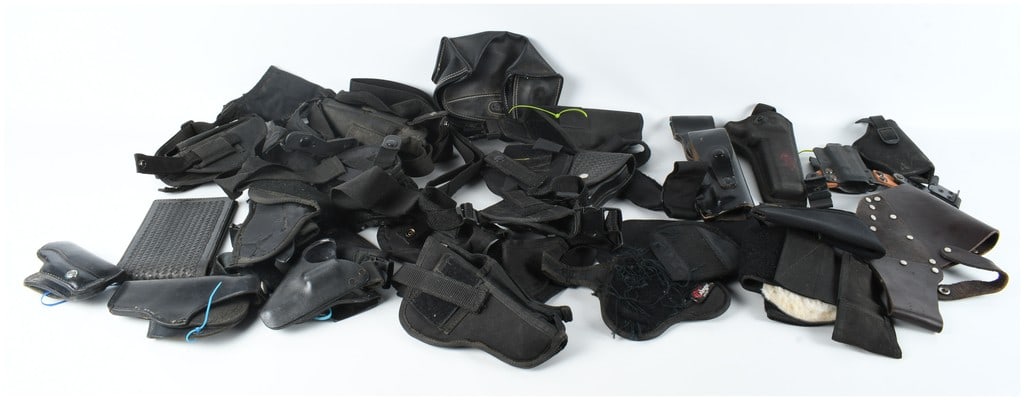 A Collection of 22 Assorted Firearm Holsters and Tactical Pouches (1 of 8)