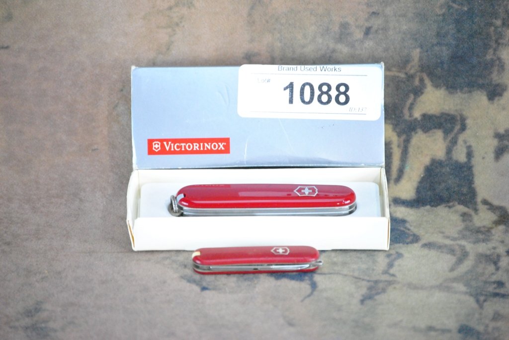 Lot of 2 Victorinox Swiss Army Knives: 1 comes in the box recruit red