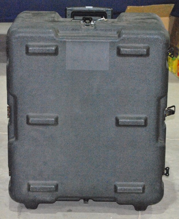 Heavy Duty Locking hard case on wheels: with teloscopic handle, heavy duty all around! Very cool case. Measures 28"X24"X16" Locking comes with keys. Top has egg crate padding on the inside.
