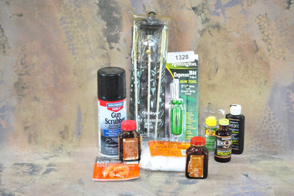 Misc. gun lot Remington Gunsmith tool, cleaning: supplies, ear plugs, hoppes bench rest 9 lubricating oil, hoppes copper solvent, gun scrubber, and a Outers rifle cleaning rod for 30 caliber