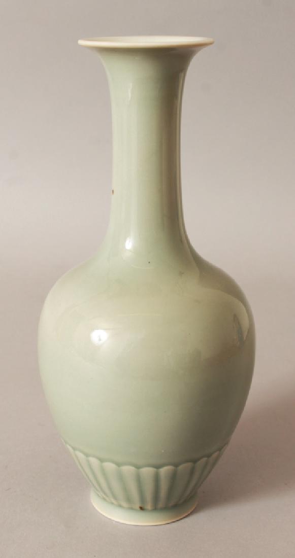 A CHINESE CELADON VASE, the foot with a moulded lappet (1 of 5)