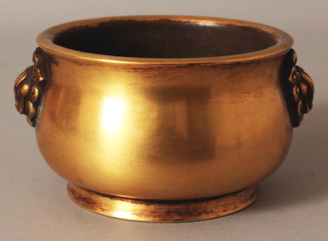 A CHINESE POLISHED BRONZE BOMBE CENSER, weighing (1 of 8)