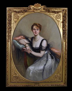 Jules Cayron (1868-1940) French. An Elegant Lady,: Jules Cayron (1868-1940) French. An Elegant Lady, Seated in an Interior, Wearing a White and Black Chiffon Dress, Oil on Canvas, Signed and Dated 1908, Painted Oval, in a Fine Gilt Composition Frame,