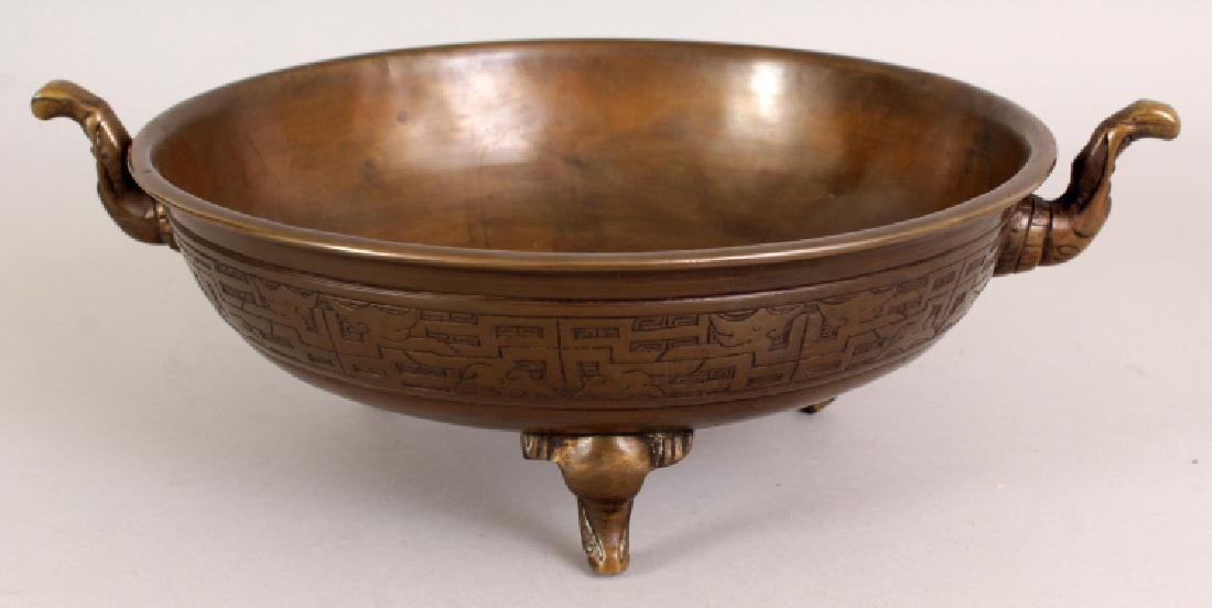 AN EARLY 20TH CENTURY CHINESE BRONZE TRIPOD CENSER, (1 of 8)