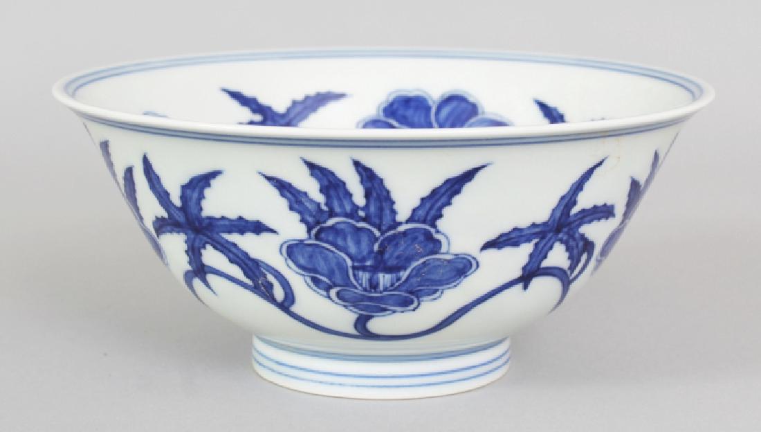 A CHINESE MING STYLE BLUE & WHITE PORCELAIN PALACE: A CHINESE MING STYLE BLUE & WHITE PORCELAIN PALACE BOWL, the interior and sides decorated with Musk Mallow, the base with a six-character Chenghua mark, 6.1in diameter & 2.7in high.