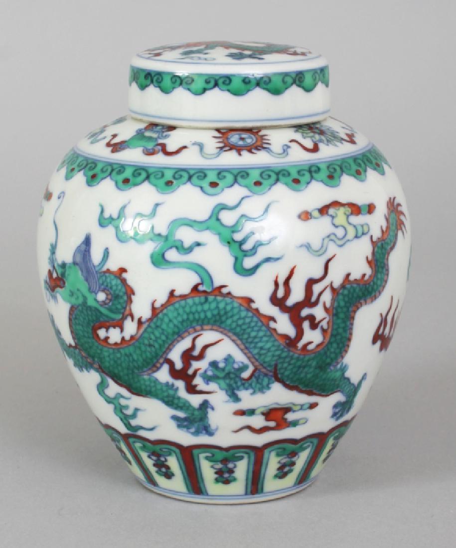 A CHINESE DOUCAI DRAGON JAR & COVER, the shoulders with (1 of 10)