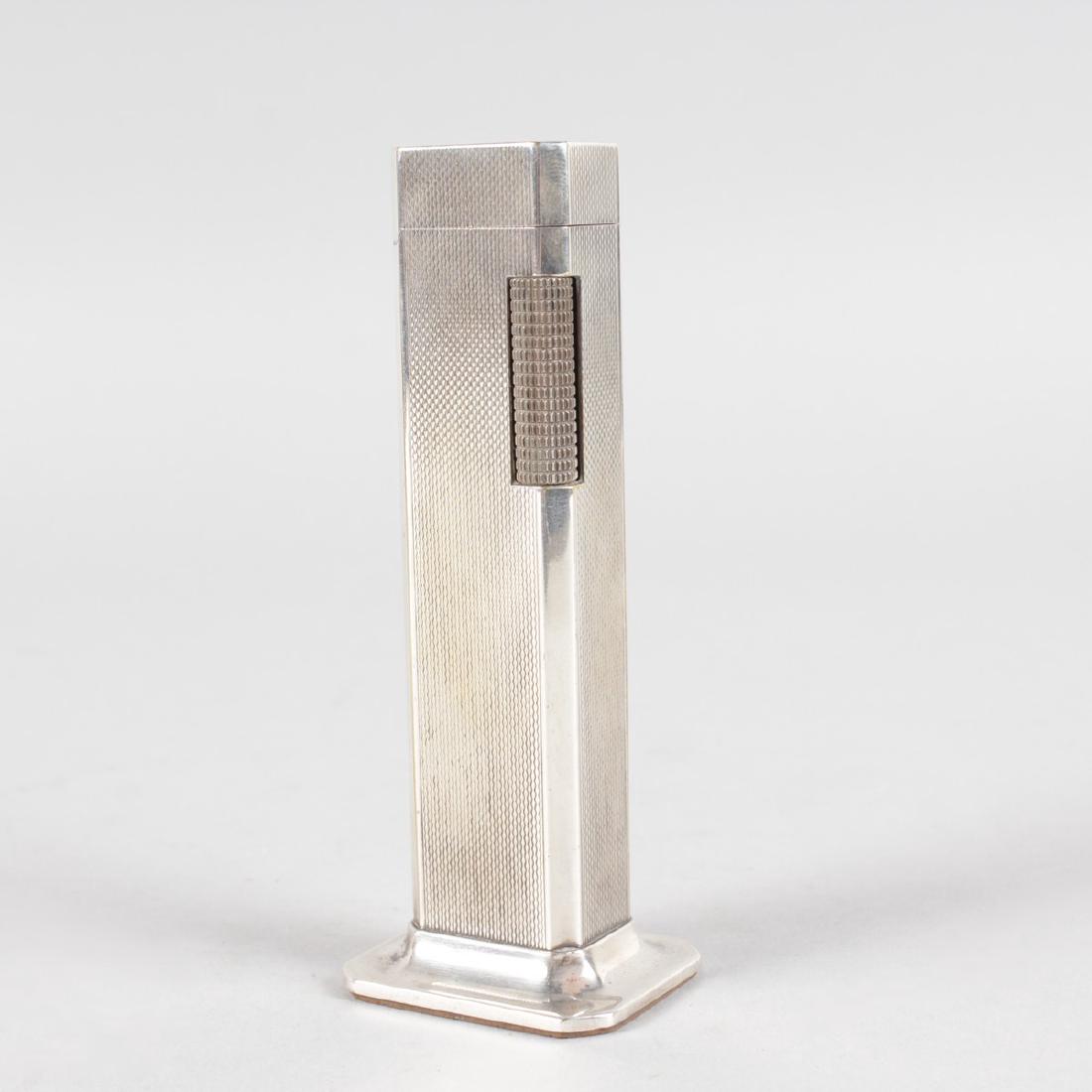 A DUNHILL TALLBOY LIGHTER.: A DUNHILL TALLBOY LIGHTER.