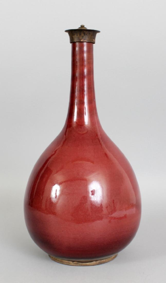 A CHINESE 18TH CENTURY SANG-DE-BOEUF PORCELAIN BOTTLE (1 of 6)