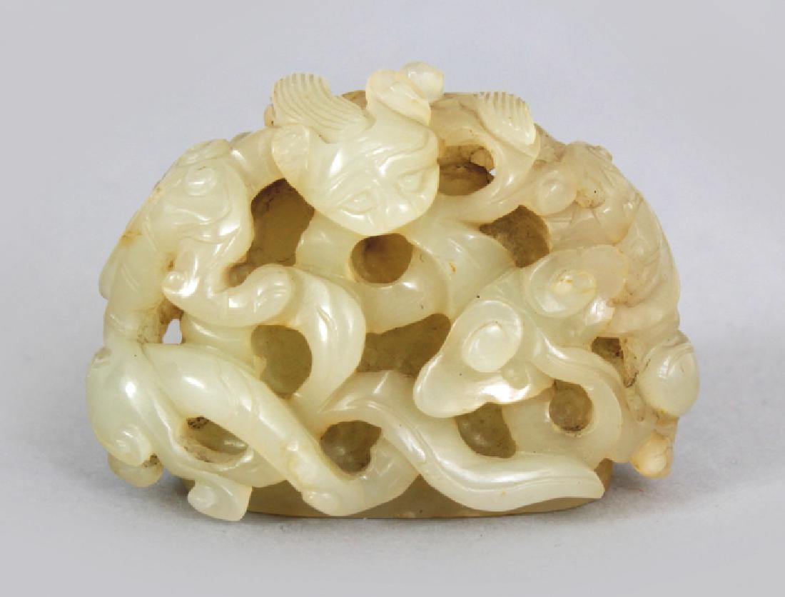 A 17TH CENTURY CHINESE LATE MING DYNASTY CELADON JADE (1 of 7)