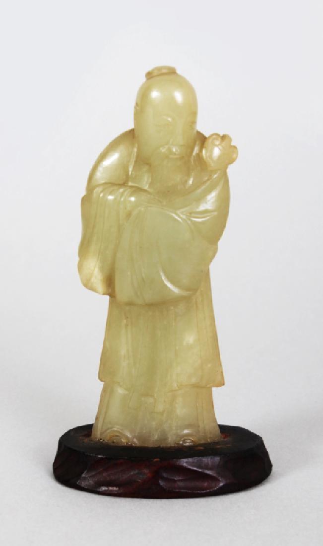 AN 18TH/19TH CENTURY CHINESE CELADON JADE FIGURE OF (1 of 7)
