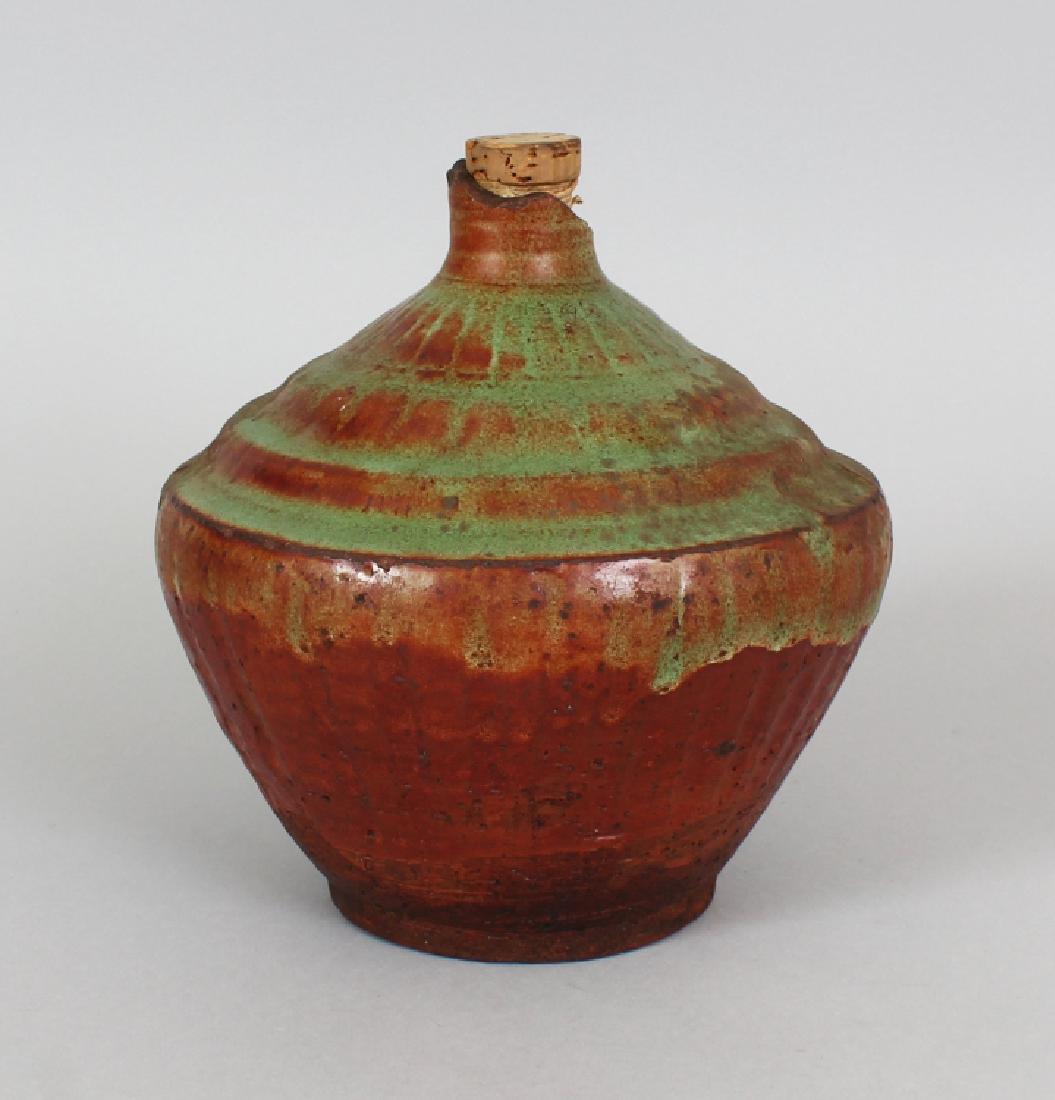 AN UNUSUAL STONEWARE JAR, possibly early Sawankhalok, (1 of 8)