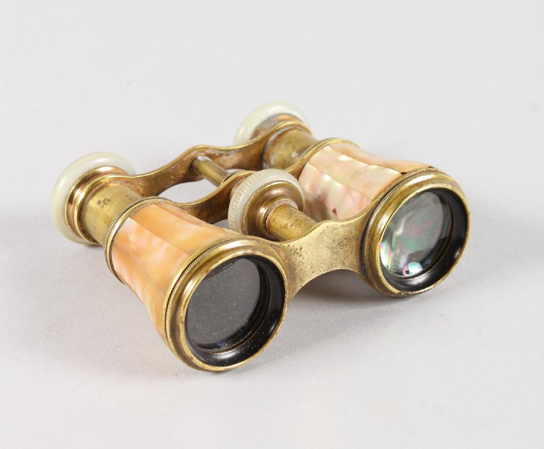 A PAIR OF MOTHER-OF-PEARL OPERA GLASSES, MARCHAND: A PAIR OF MOTHER-OF-PEARL OPERA GLASSES, MARCHAND PARIS.