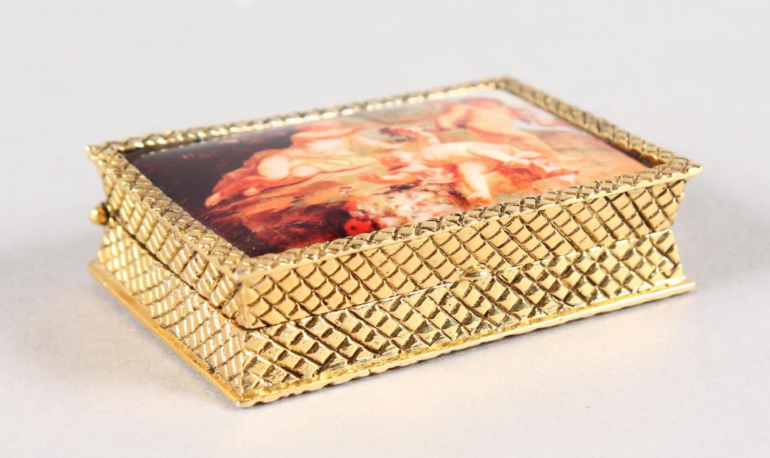 AN 18K GOLD PLATED AND ENAMEL PILL BOX.: AN 18K GOLD PLATED AND ENAMEL PILL BOX.