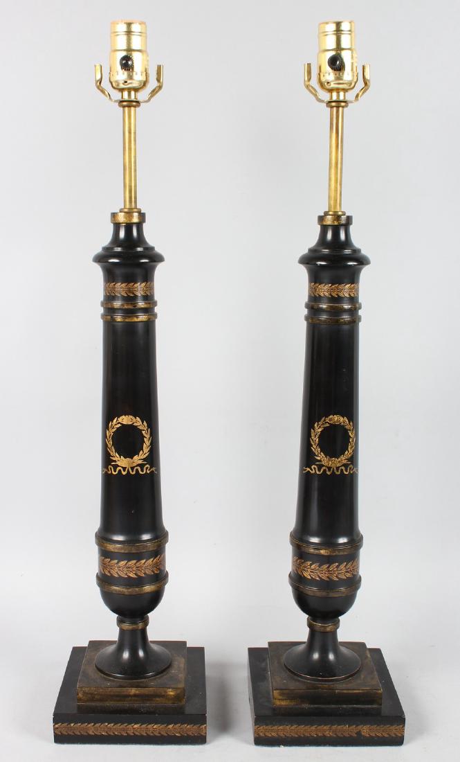 A PAIR OF REGENCY STYLE BLACK WOODEN TAPERING COLUMN (1 of 1)