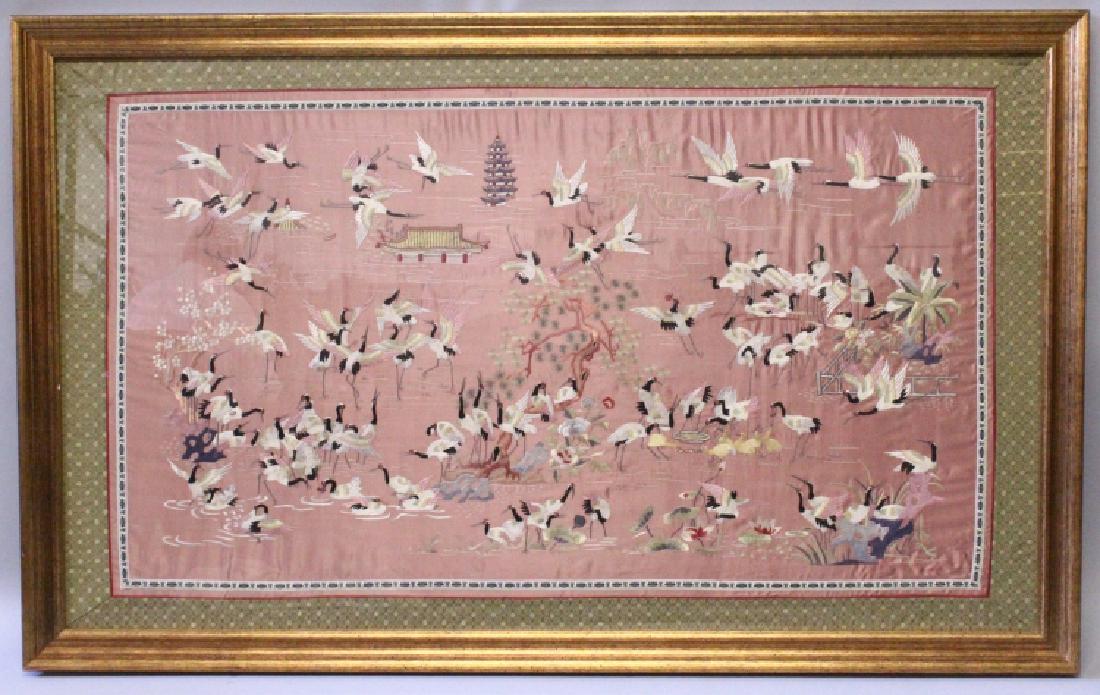 A LARGE FRAMED CHINESE RED GROUND EMBROIDERED SILK (1 of 5)