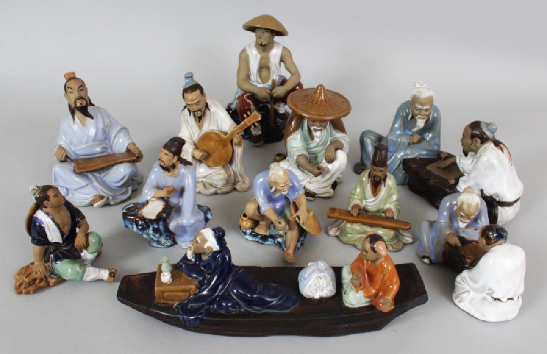 A GROUP OF ELEVEN CHINESE SHIWAN GLAZED POTTERY FIGURE (1 of 9)