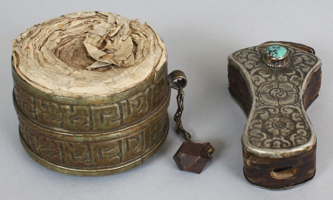 A TIBETAN SHAPED SILVER-METAL PRAYER BOX, with (1 of 2)