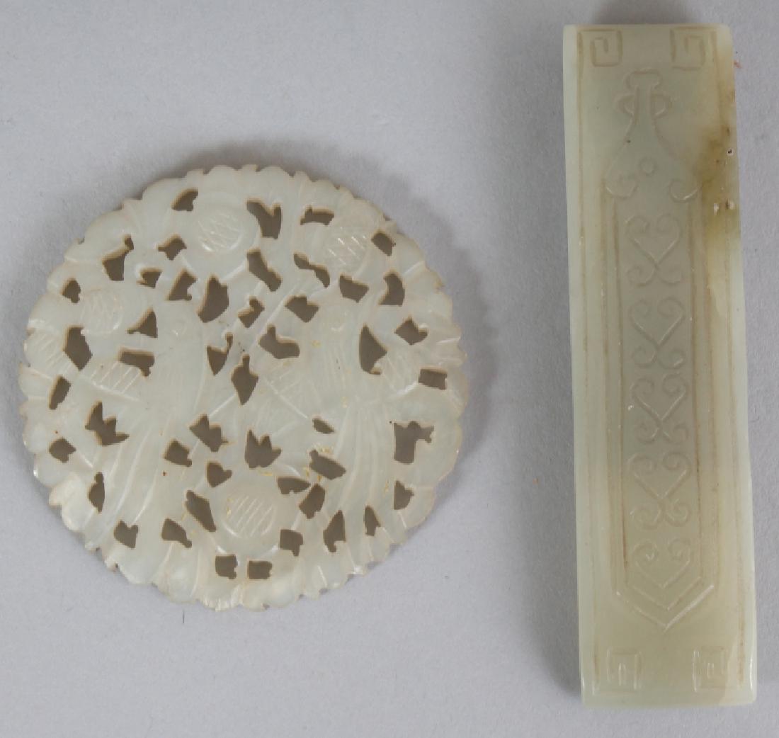 A CHINESE CELADON JADE BELT FITTING, engraved with (1 of 4)