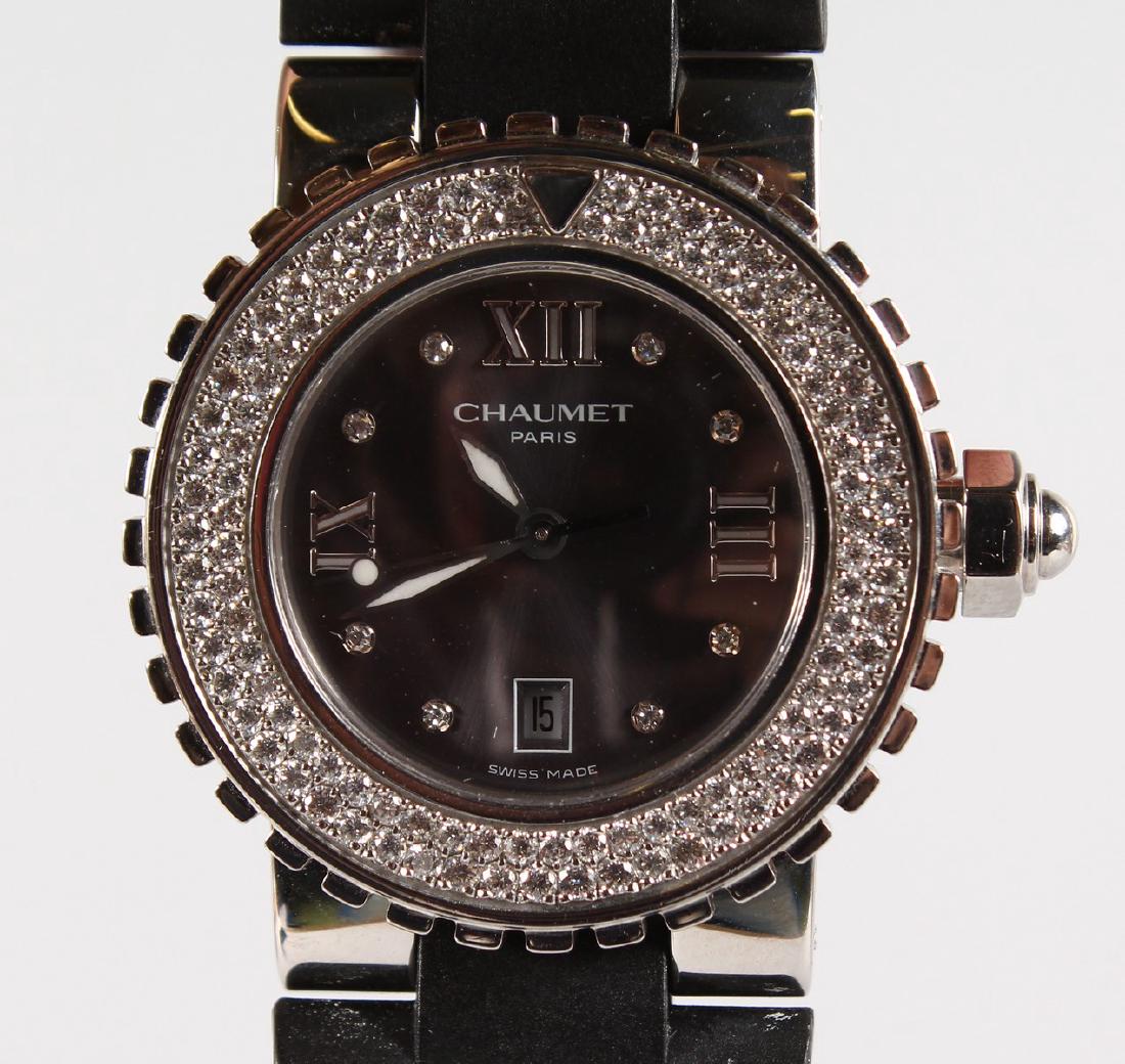 A SUPERB LADIES OR GENTS CHAUMET, PARIS DIAMOND MOUNTED: A SUPERB LADIES OR GENTS CHAUMET, PARIS DIAMOND MOUNTED WRISTWATCH with original strap, Watch No. 622938.
