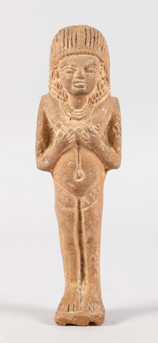 AN ANCIENT EGYPTIAN SHABTI FIGURE. 6ins long.: AN ANCIENT EGYPTIAN SHABTI FIGURE. 6ins long.