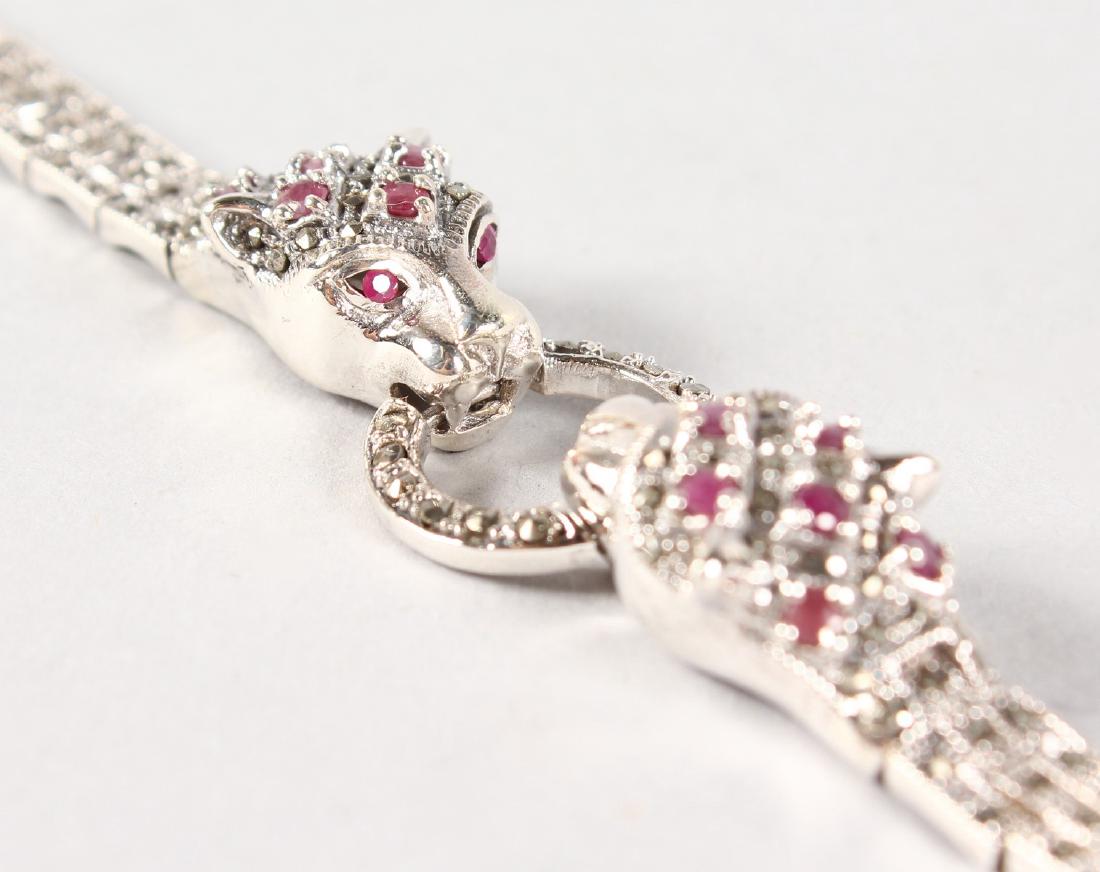 A SILVER, MARCASITE AND RUBY PANTHER BRACELET.: A SILVER, MARCASITE AND RUBY PANTHER BRACELET.