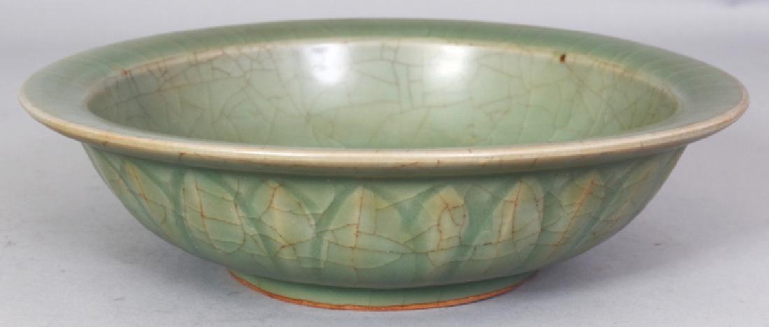 A CHINESE SONG STYLE LONGQUAN CELADON TWIN FISH DISH, (1 of 5)