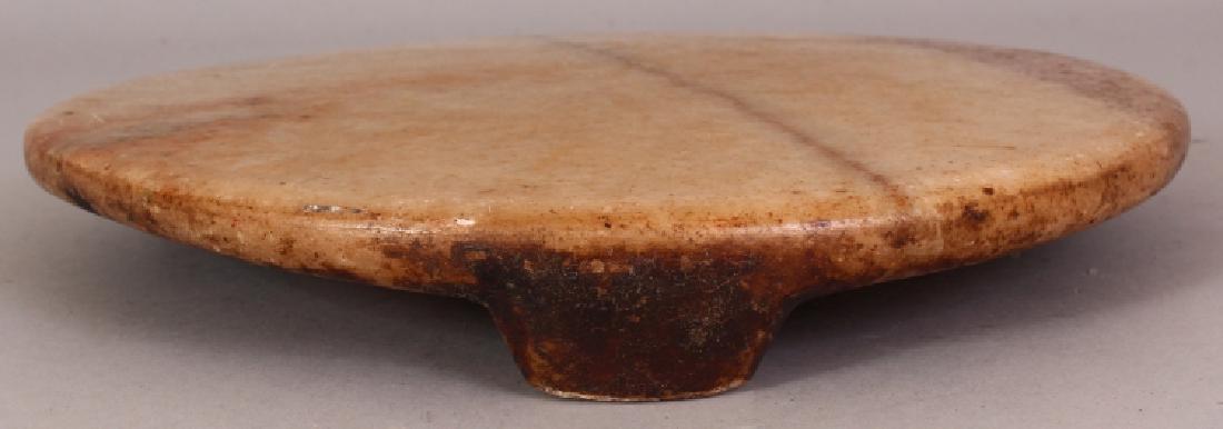 AN UNUSUAL INDIAN MARBLE STAND, the underside carved (1 of 4)