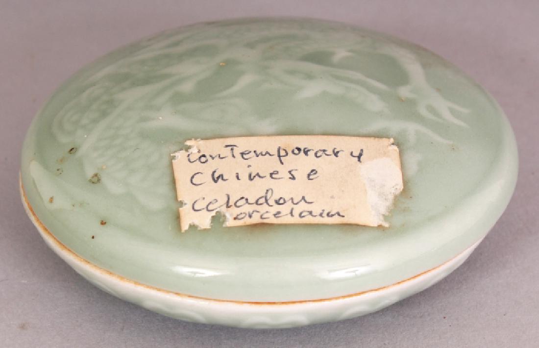 A 20TH CENTURY CHINESE SHALLOW CIRCULAR CELADON (1 of 10)
